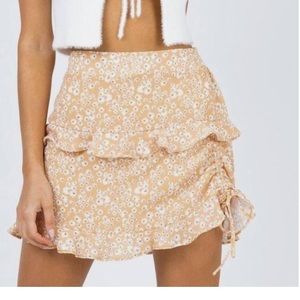 Princess Polly peach skirt with white flowers